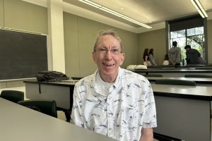 Bob Buehler encourages everyone to approach life with open arms. He reminds his much younger classmates that, despite what the old adage says, you can teach an old dog new tricks.
