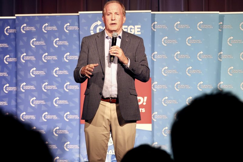 Attorney General Ken Paxton speaking at a Turning Point USA event. 