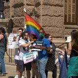 Trans Day of Visibility rally attendees protest Gov. Greg Abbott's recent orders at the Texas State Capitol. (Photo: Sam Stark, Reporting Texas TV)