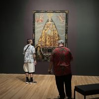 Visitors view "Our Lady of Bethlehem with a donor" at the Blanton Museum of Art in Austin, Texas on Oct. 22, 2022. (Photo: Oihane Ochoa)