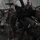 Samuel Olatunbosun works on a daily rental bike at the Orange Bike Project in Austin, Texas, on Oct. 2, 2023, (Mariela Villela/Reporting Texas TV)