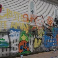 Attendees spray painted a mural on stretch wrap at the South Main Arts Festival in Georgetown, Texas, on Oct. 21, 2023, (Mariela Villela/Reporting Texas TV)