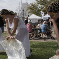 Circus Picnic ribbon dancers at Georgetown's South Main Arts Festival in Georgetown, Texas, on Oct. 21, 2023, (Mariela Villela/Reporting Texas TV)