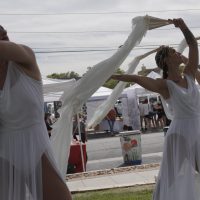 Circus Picnic ribbon dancers danced to live music at Georgetown's South Main Arts Festival in Georgetown, Texas, on Oct. 21, 2023, (Mariela Villela/Reporting Texas TV)