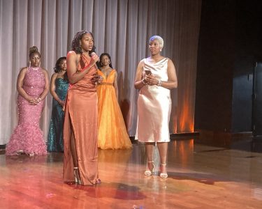Kayla Price takes center stage during Q&A portion of the pageant. (Mahlah Freeman/Reporting Texas TV)
